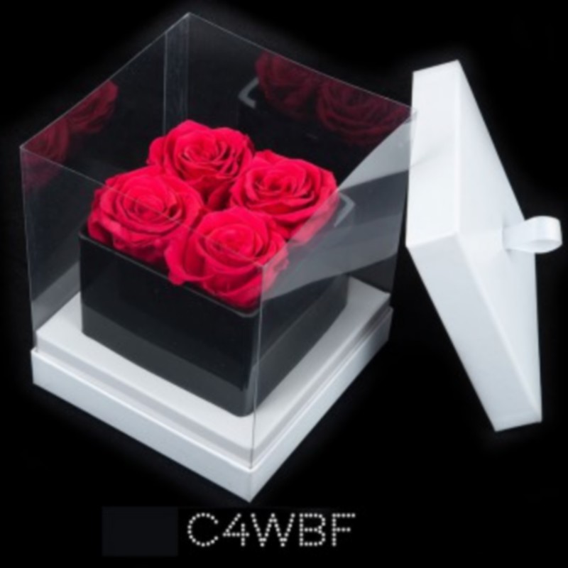 cube noir 4 roses fushias boite blanche