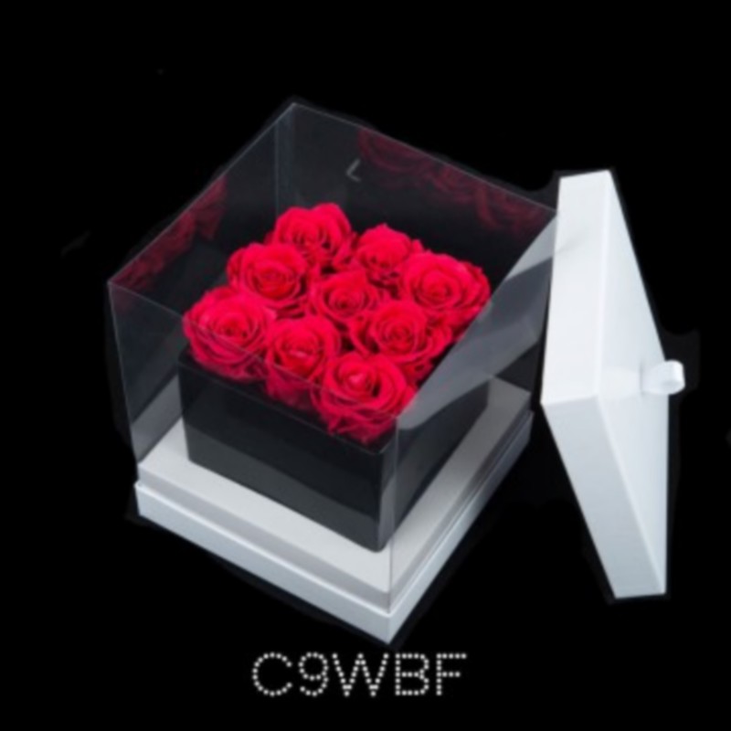 cube noir 9 roses fushias boite blanche